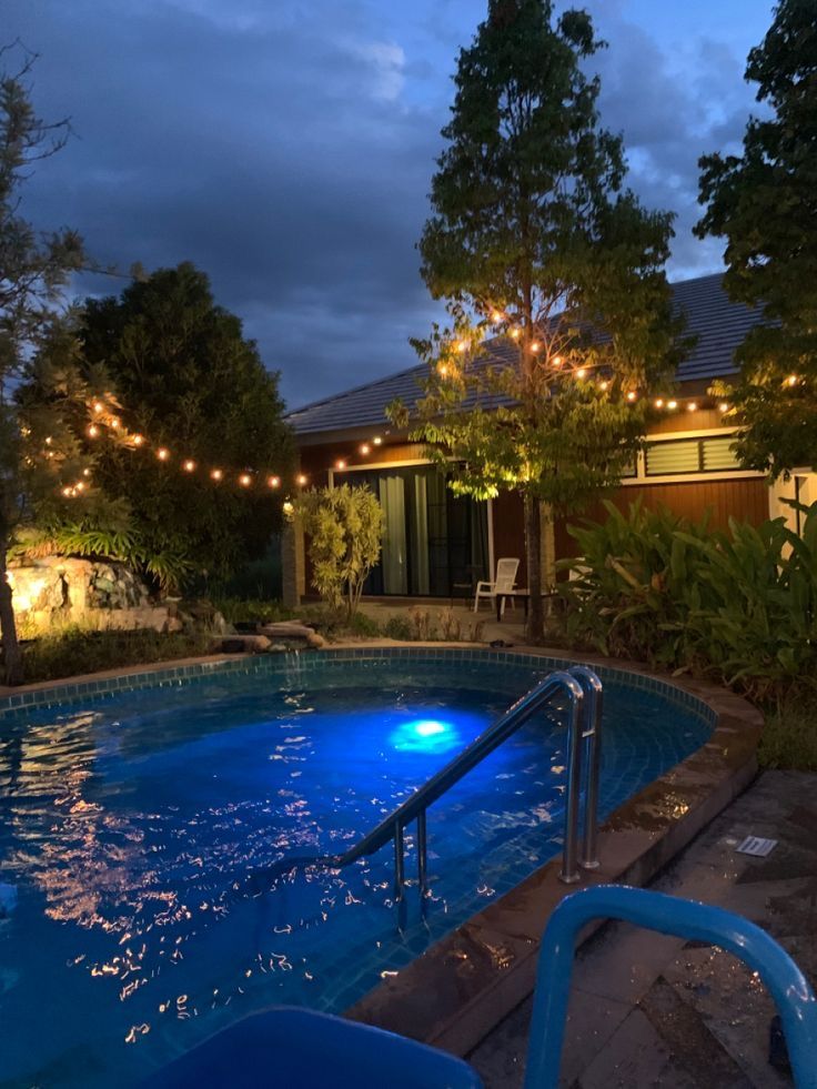 inground pool at night
