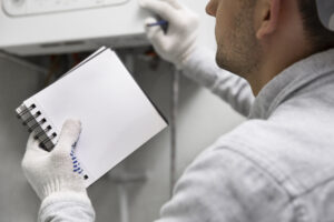 worker-repairing-water-heater (2)